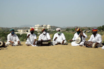 in-india,-traditional-tunes-bind-communities-against-covid-19